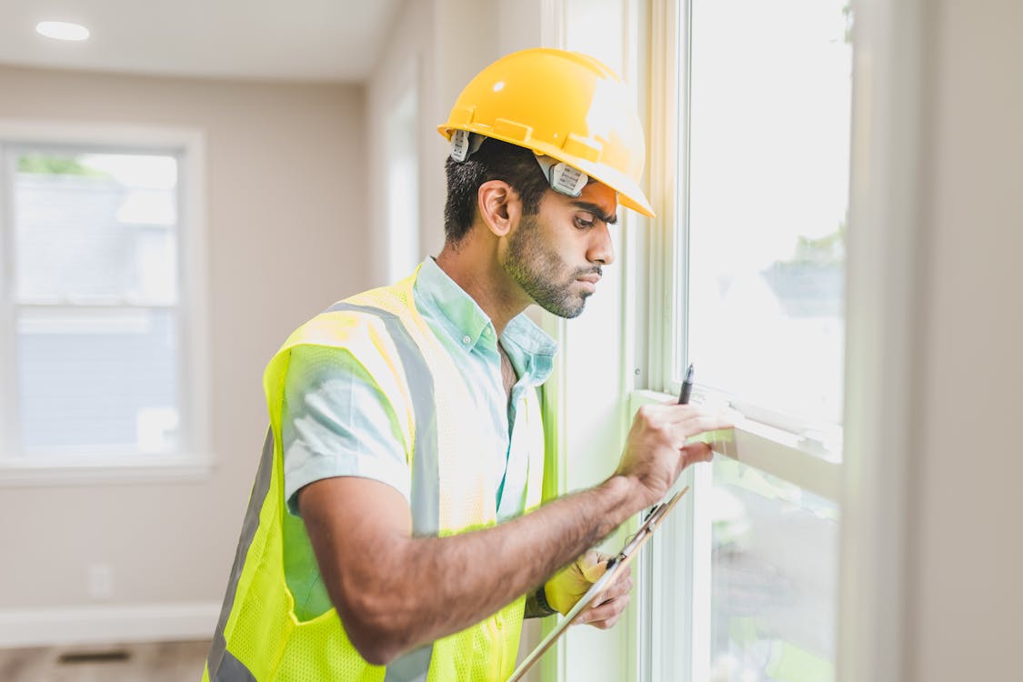 Safety inspector reviewing construction site
